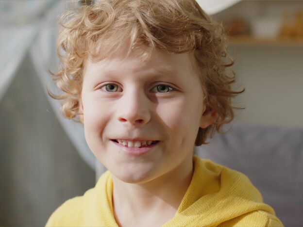 portrait of cheerful caucasian boy